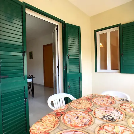 Romi Con Veranda In Baia Verde